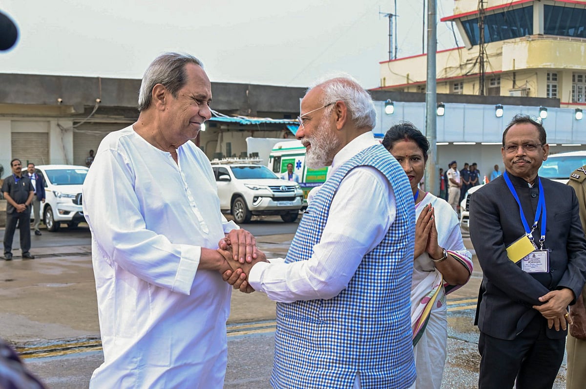 PTI : PM Narendra Modi being welcomed by Odisha CM Naveen Patnaik upon his arrival in the state on Tuesday |