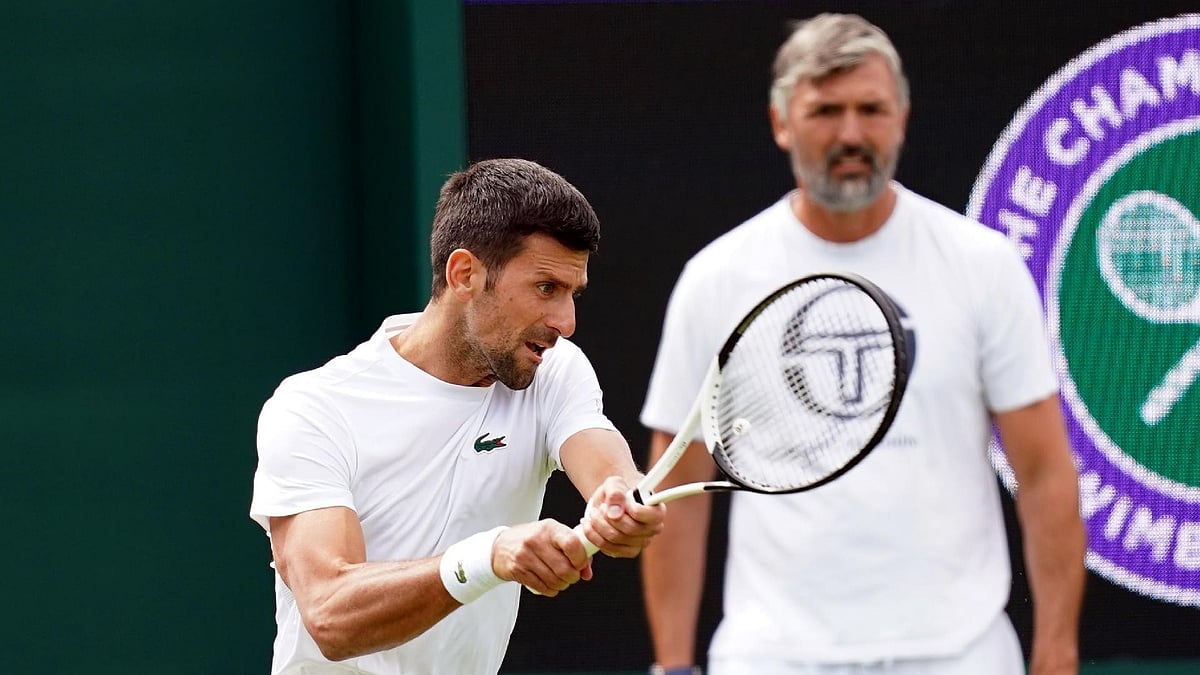 Goran Ivanisevic, right, with Novak Djokovic at Wimbledon. - Photo: John Walton/PA