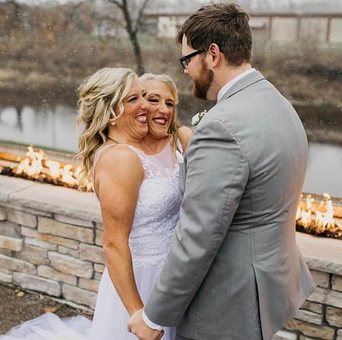 Abby Hensel and Josh Bowling on their wedding day.