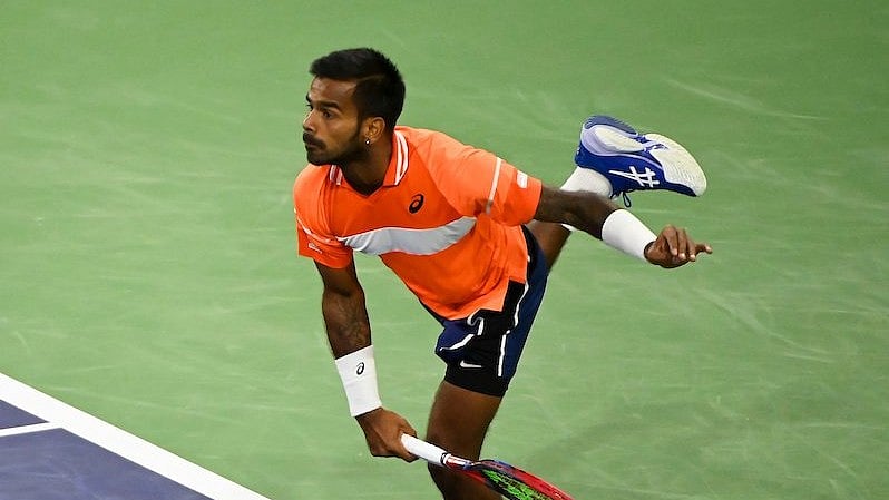 (Photo: X|BNP Paribas Open) : Sumit Nagal in action at the BNP Paribas Open 2024 playing the first round against Milos Raonic, in California, USA on March 8, Friday. 