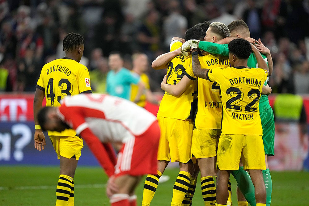 Photo: AP/Matthias Schrader : German Bundesliga Soccer Match