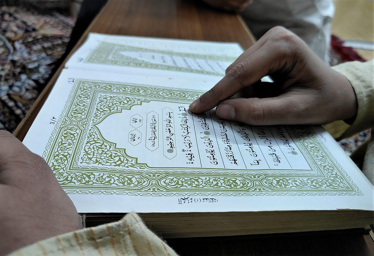A boy reciting the Quran