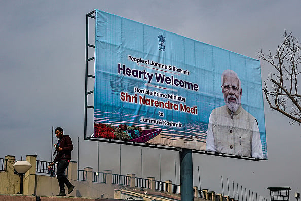 Getty Images : A hoarding welcoming Prime Minister Narendra Modi to Jammu and Kashmir