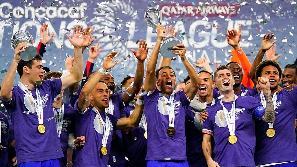 AP/Julio Cortez : United States players celebrate on the podium after their win over Mexico in the CONCACAF Nations League 2023-24 final on Monday (March 25) in Arlington.
