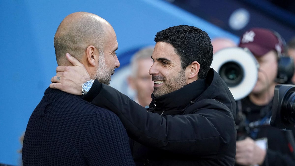 Mikel Arteta (right) has praised Pep Guardiola. - Martin Rickett/PA)