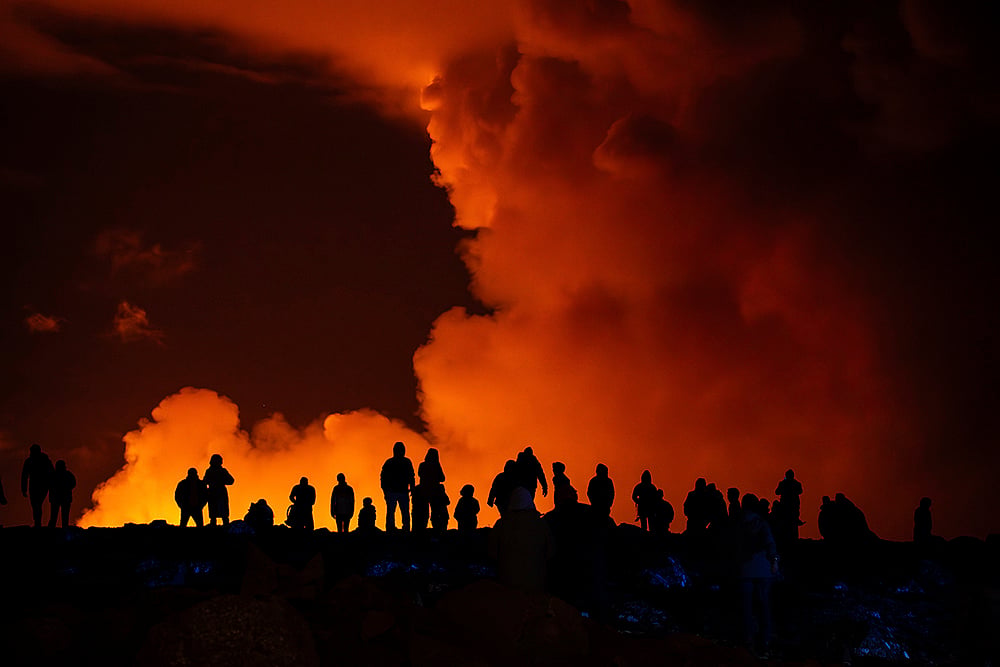 | Photo: AP/Marco di Marco : Iceland Volcano