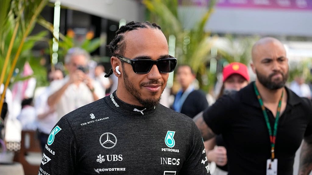 (AP | Darko Bandic) : Mercedes driver Lewis Hamilton of Britain prepares for the first practice session ahead of the Formula One Saudi Arabian Grand Prix at the Jeddah Corniche Circuit in Jeddah, Saudi Arabia, Thursday, March 7, 2024. The Saudi Arabian Grand Prix will be held on Saturday, March 9, 2024. 


