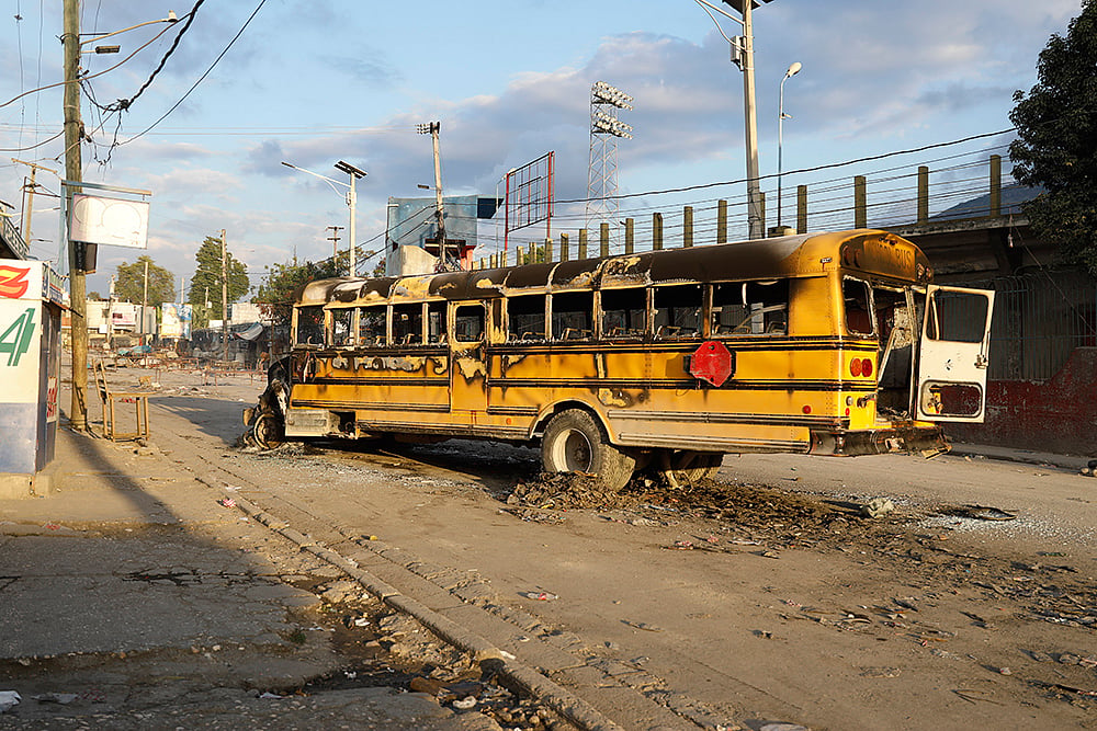 | Photo: AP/Odelyn Joseph : Coordinated gang attacks hit Haiti's  capital Port-au-Prince