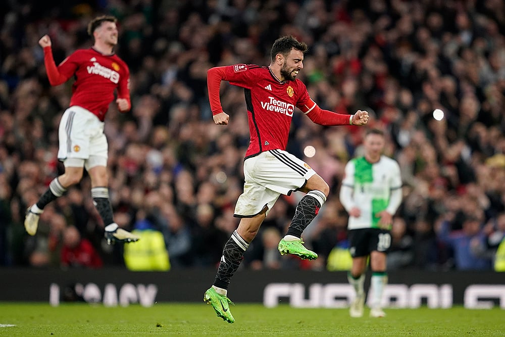| Photo: AP/Dave Thompson : FA Cup Quarter-Final: Manchester United vs Liverpool