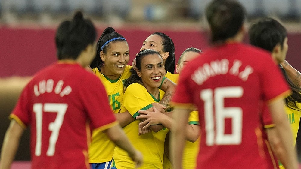 File : Marta (C) is known as one of the best female footballers to have ever taken the pitch.