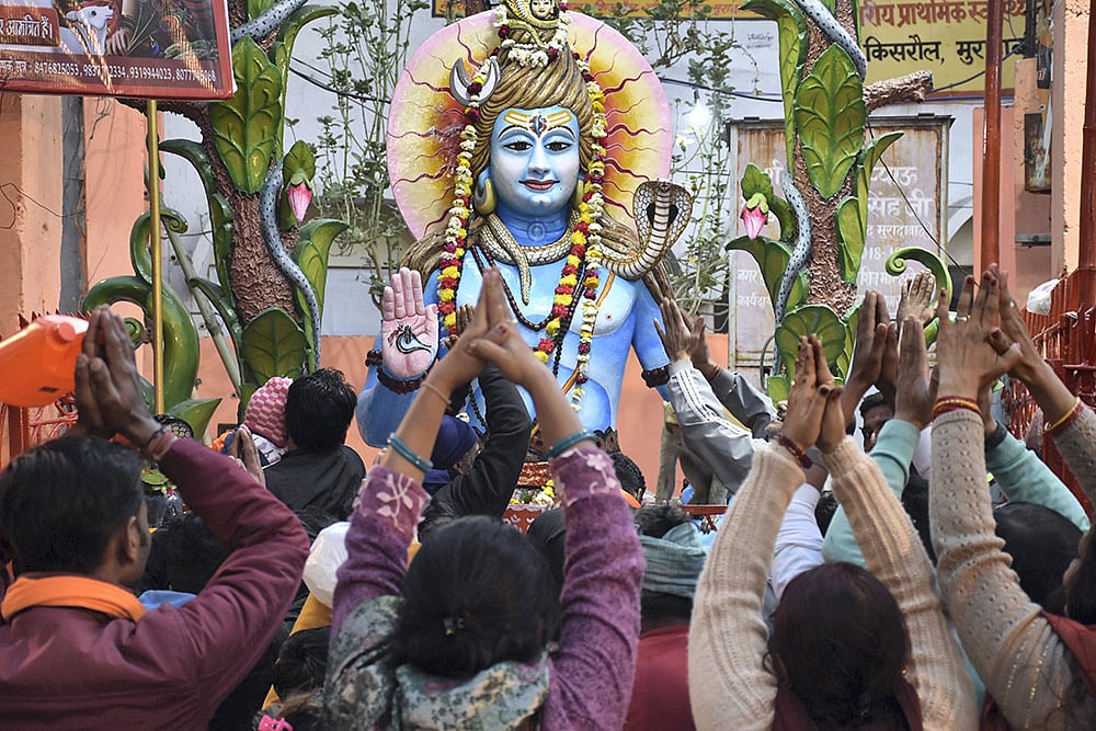 Photo: PTI : Fourteen children in Kota, Rajasthan, suffered burn injuries from electric shock during a Mahashivratri procession.