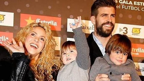 Shakira with Gerard and their kids 