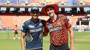 Photo: X/ @IPL : Gujarat Titans captain Shubman Gill (L) with Sunrisers Hyderabad skipper Pat Cummins at the toss time in IPL 2024.