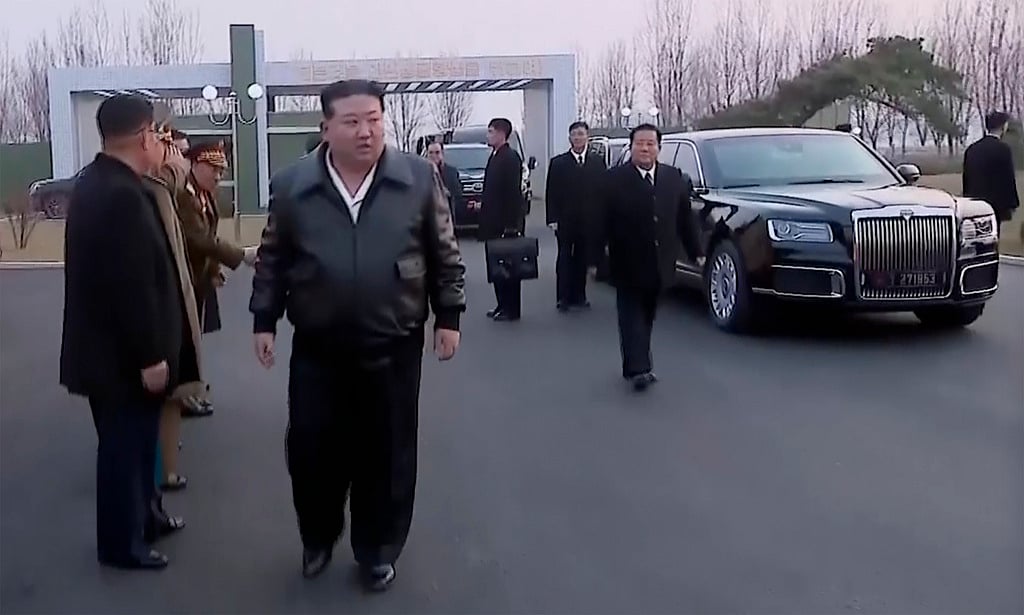 AP : In this image made from video broadcasted by North Korea's KRT, North Korean leader Kim Jong, foreground, arrives at a greenhouse farm in Pyongyang, North Korea


