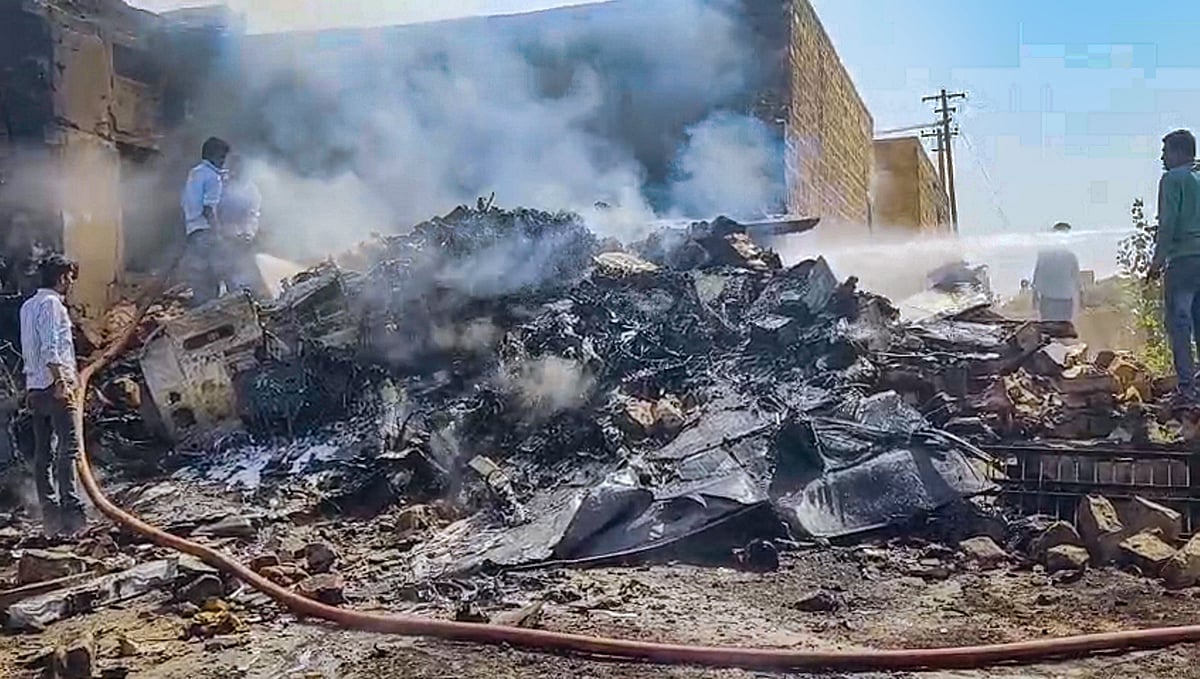 PTI : Jaisalmer: Firefighters try to extinguish the fire at the crash site after a Tejas aircraft of the Indian Air Force (IAF) crashed during an operational training sortie, near Jaisalmer, Tuesday, March 12, 2024