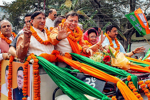 CM Dhami with Mala Rajya Laxmi Shah in Doon