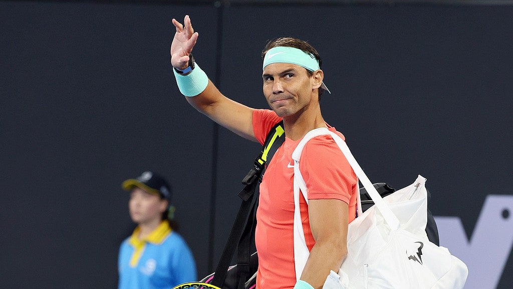 (AP Photo/Tertius Pickard, File)
 : Rafael Nadal, of Spain, waves to the crowd at his doubles match during the Brisbane International tennis tournament in Brisbane, Australia. He pulled out of the Indian Wells Open on Wednesday night, March 6, 2024, a day before he was supposed to play his first official match in two months. 