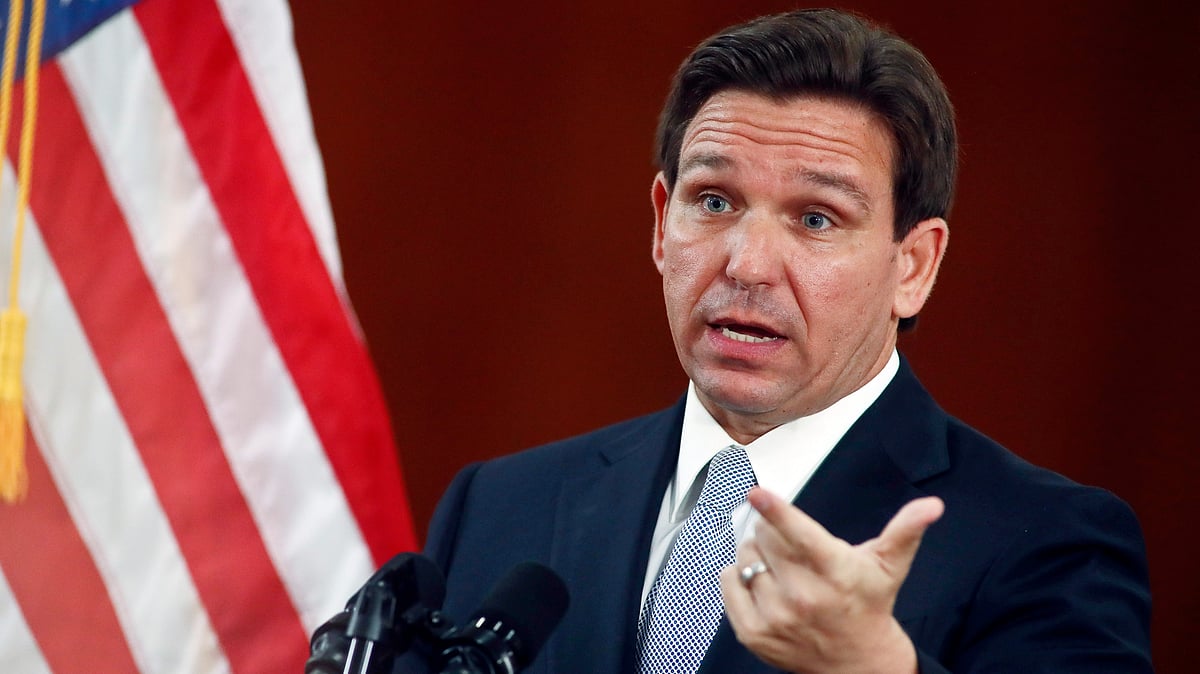 AP : Florida Gov. Ron DeSantis answers questions from the media, March 7, 2023, at the state Capitol in Tallahassee, Florida.