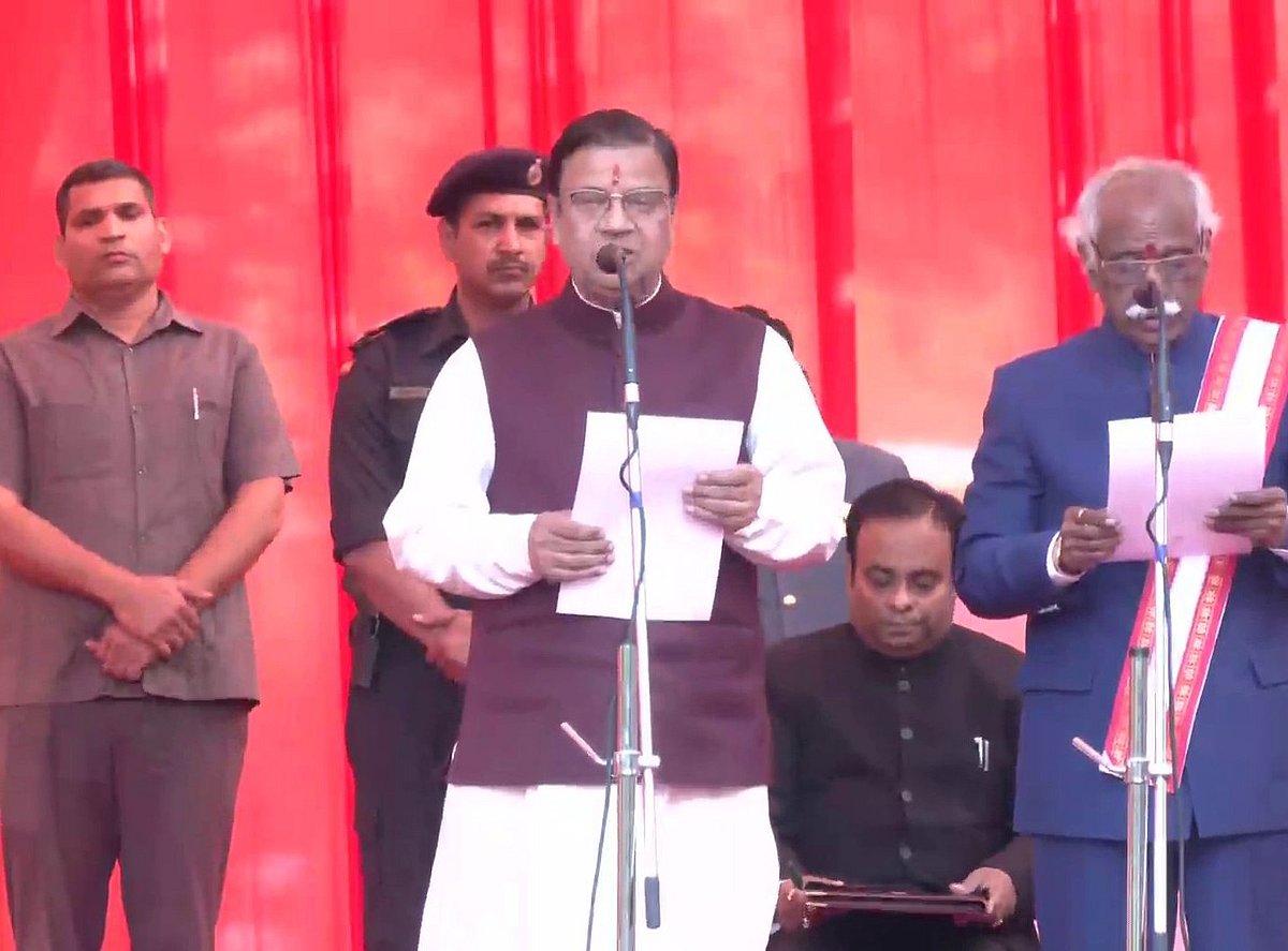 BJP leader Dr Kamal Gupta taking oath as minister - ANI