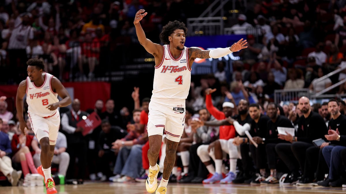 Jalen Green (#4) of the Houston Rockets reacts after a three-point shot in the second half of an NBA game against the Utah Jazz at Toyota Center on Sunday (March 24, 2024). - null