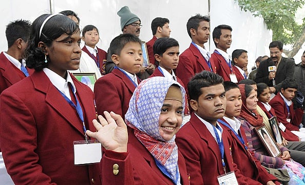 Resham Fatma (white scarf), acid attack victim and National Bravery Bharat Award winner from Uttar Pradesh. - Getty Images