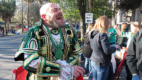 Brian Welzenbach laughs with friends, March 17, 2017, while celebrating St. Patrick's Day in Savannah.