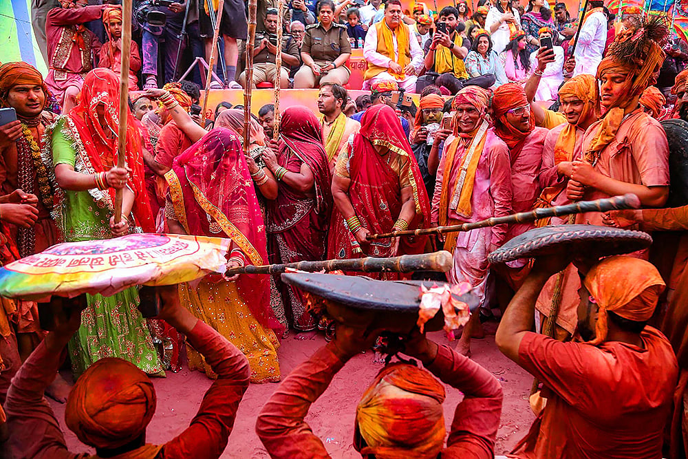 | Photo: PTI : Lathmar Holi Celebration