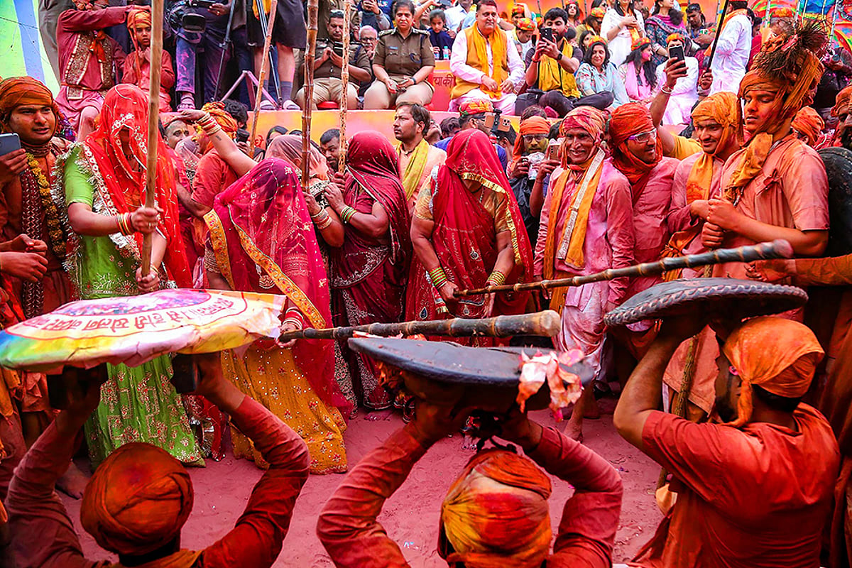 UP's Mathura Drenched In Colours Of 'Lathmar Holi' Celebrations | In Pics