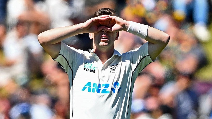 AP : New Zealand's Matt Henry covers his eyes after bowling to Australia's Cameron Green on the second day of their first Test in Wellington, March 1, 2024.