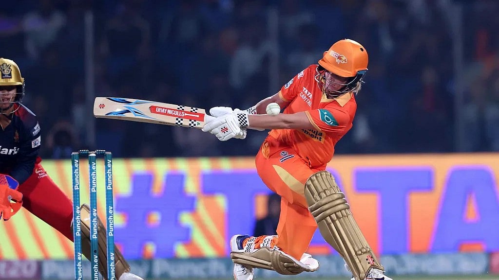 Photo: WPL T20 website : Beth Mooney (right) bats during match 13 of Women's Premier League 2024 between Gujarat Giants and Royal Challengers Bangalore in Delhi.