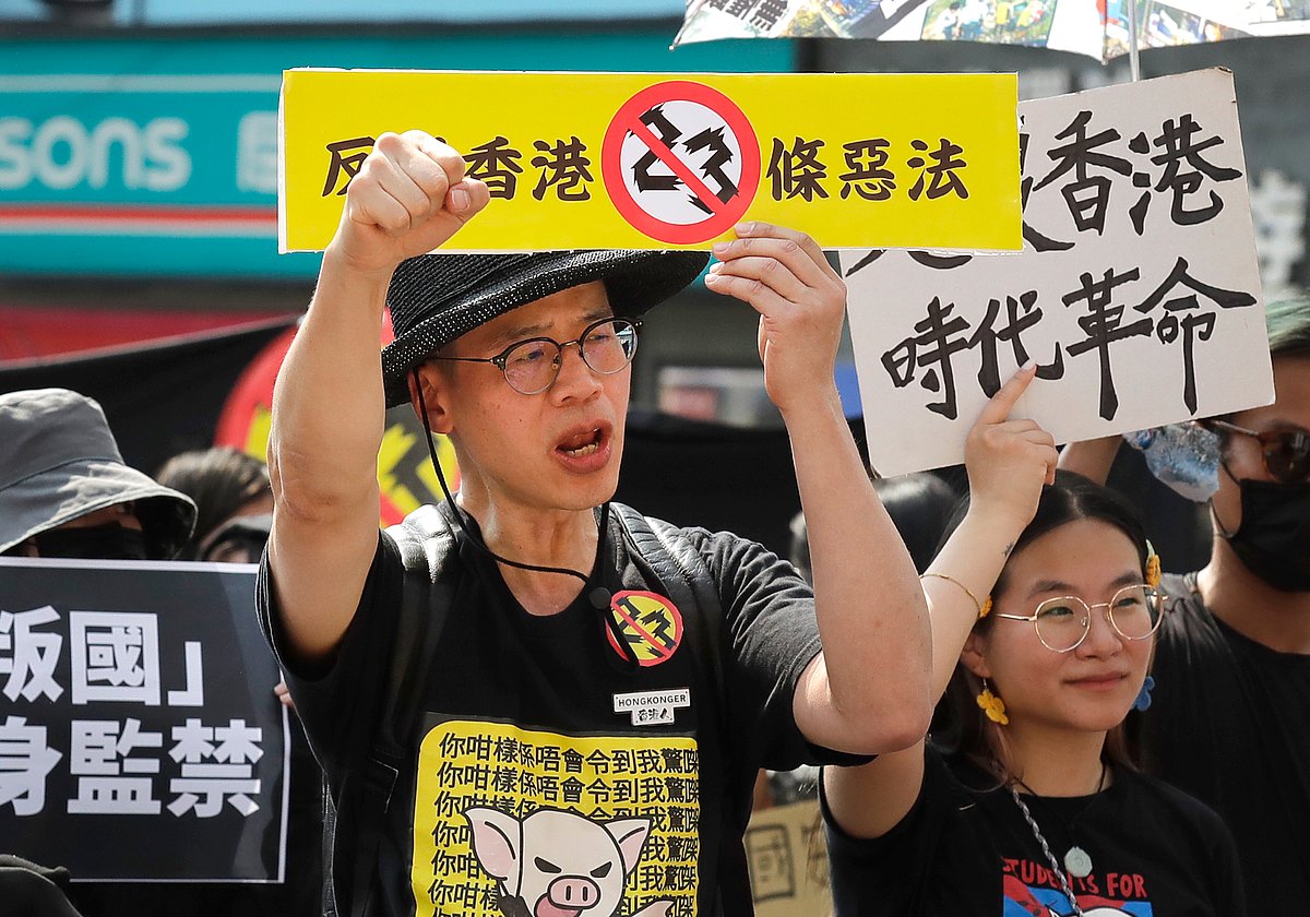 Hong Kong activists in Taiwan and supporters hold a protest against Hong Kong's new national security law - AP
