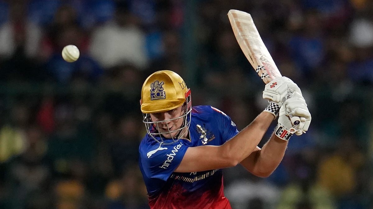Royal Challengers Bengaluru's Cameron Green plays a shot during the Indian Premier League cricket match between Royal Challengers Bengaluru and Kolkata Knight Riders in Bengaluru, India, Friday, March 29, 2024.  - (AP Photo/Aijaz Rahi)
