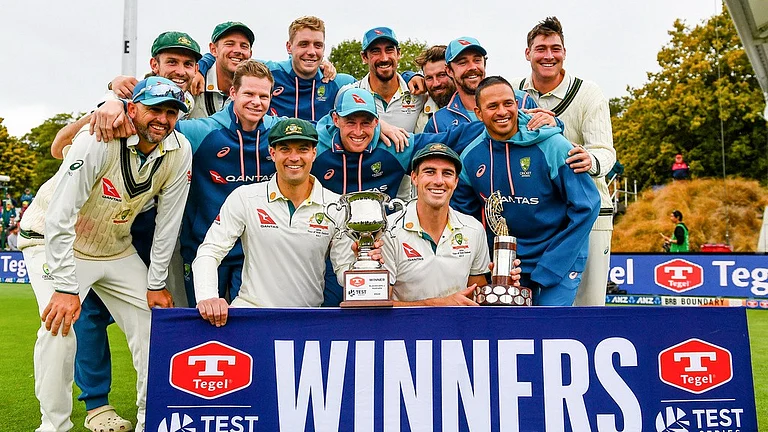 Australia players pose with their trophies after defeating New Zealand in the second Test in Christchurch on Monday (March 11, 2024). - John Davidson/Photosport via AP