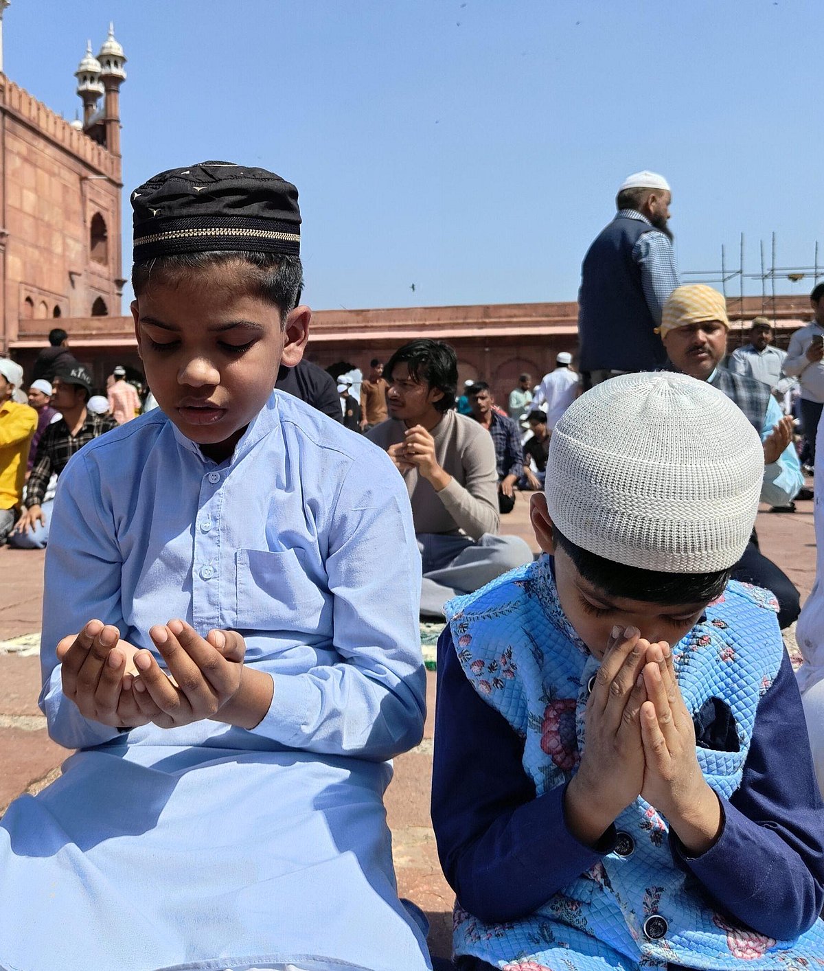 Children praying on the last Friday of the Islamic month Shaban