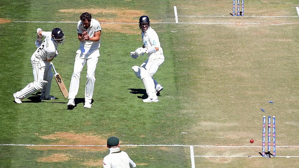 (Kerry Marshall/Photosport via AP) : Australia's Mitchell Start, second left, flinches after New Zealand's Kane Williamson, left, and Will Young, right, collide and Williamson is run out on the second day of their cricket test match in Wellington, New Zealand, Friday March 1, 2024. 

