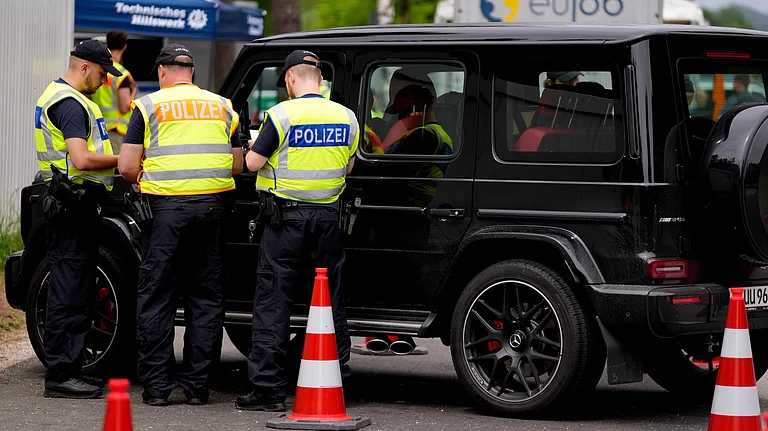 German police at a checkpoint near the Austrian-German border in Mittenwald, Germany on June 22, 2022. - AP