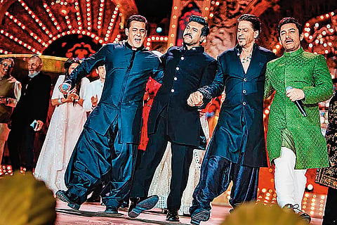 Superstars Salman Khan, Ram Charan, Shah Rukh Khan, and Aamir Khan dancing at the event