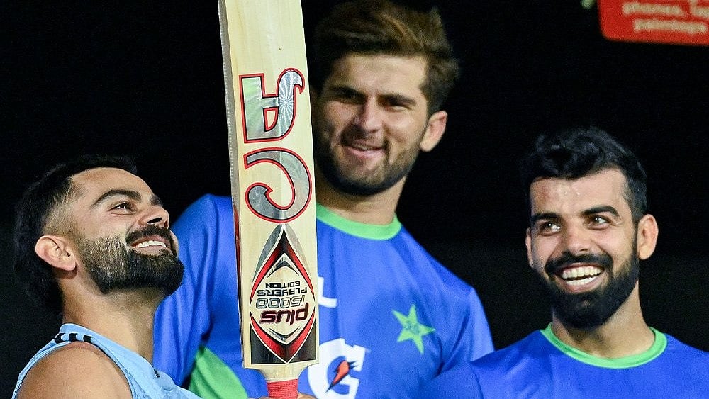 Virat Kohli with Shaheen Shah Afridi and Shadab Khan - X/@ICC