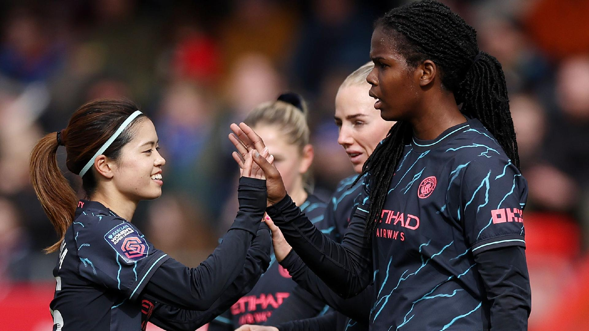  Steven Paston/PA : Khadija Shaw (right) celebrates scoring Manchester City’s third goal against Brighton.