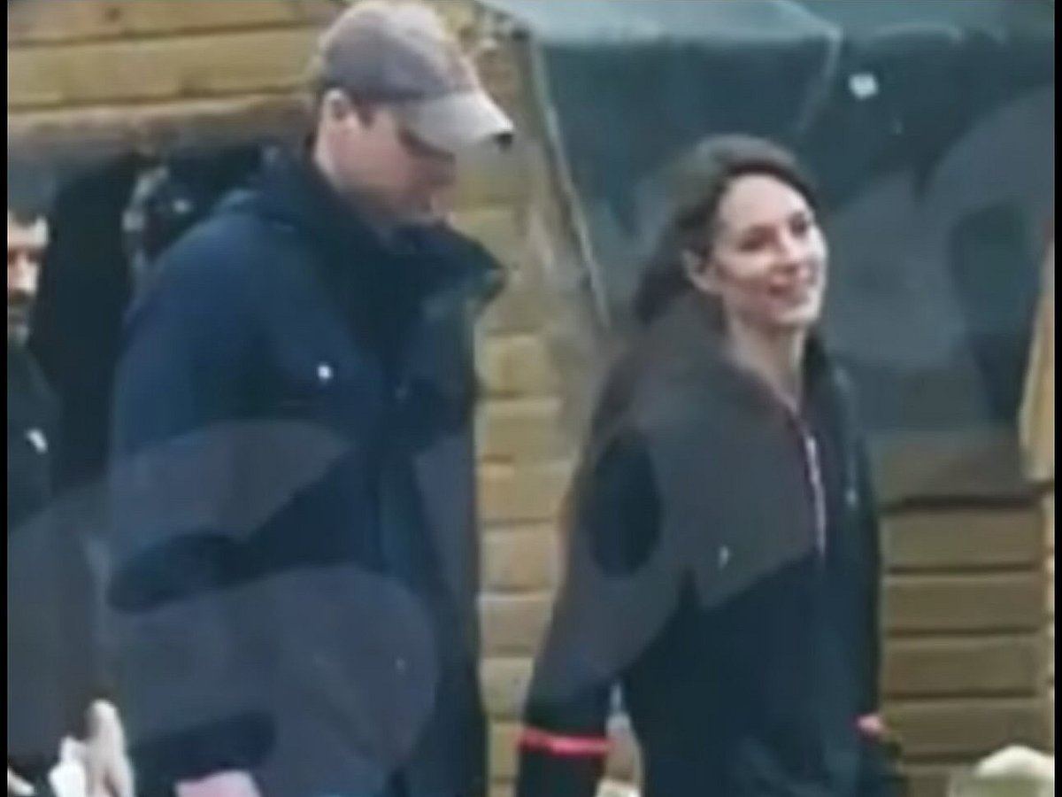 According to the thesun.co.uk, the photo is of Kate Middleton strolling through the car park at a farm shop. - thesun.co.uk