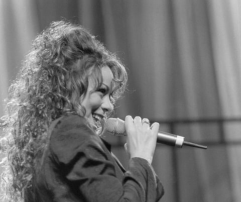 Mariah Carey  performing(1990).
