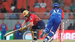 AP Photo/Pankaj Nangia : Delhi Capitals' Rishabh Pant, right, attempts to stump out Punjab Kings' Jitesh Sharma during the Indian Premier League cricket tournament match between Delhi Capitals and Punjab Kings in Mullanpur.