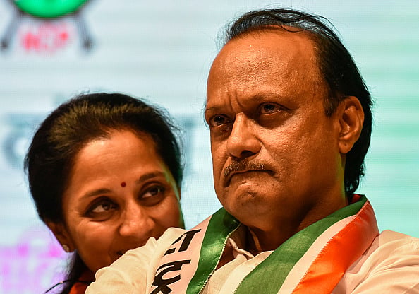 Getty Images : NCP leader Ajit Pawar and Supriya Sule at a 'Save the Constitution' meet held during the national convention of the NCP women's wing, at the YB Chavan Auditorium, on June 20, 2018 in Mumbai, India.