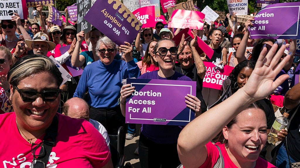 Protesters cheer during a Planned Parenthood rally in support of abortion access outside the U.S. Supreme Court, April 15, 2023, in Washington. - AP