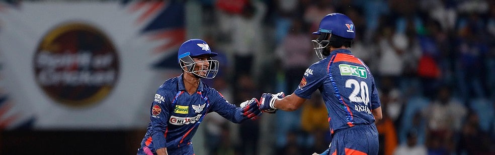 AP/Surjeet Yadav : Lucknow Super Giants' Ayush Badoni, left, celebrates scoring runs with batting partner Arshad Khan during the Indian Premier League cricket match between Lucknow Super Giants and Delhi Capitals in Lucknow, India, Friday, April 12, 2024.