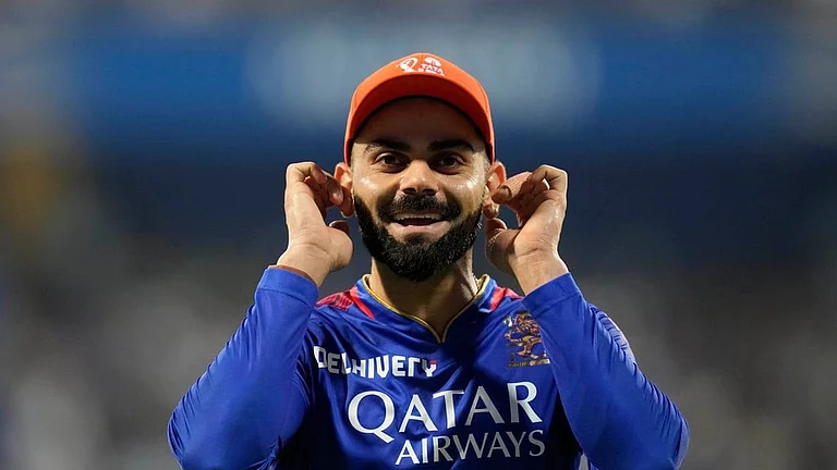 Virat Kohli reacts to the crowd during the Indian Premier League 2024 match between Mumbai Indians and Royal Challengers Bengaluru at the Wankhede Stadium. - AP/Rajanish Kakade