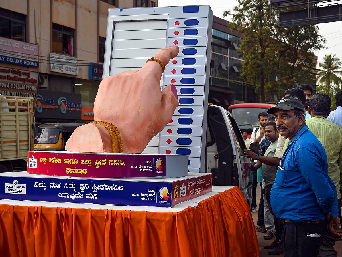 (PTI Photo)  : A voting awareness tableau vehicle plies acorss the city as part of an election campaign under the Systematic Voters' Education and Electoral Participation (SVEEP) programme, ahead of the Lok Sabha polls, in Hubballi, Thursday, April 4, 2024. 