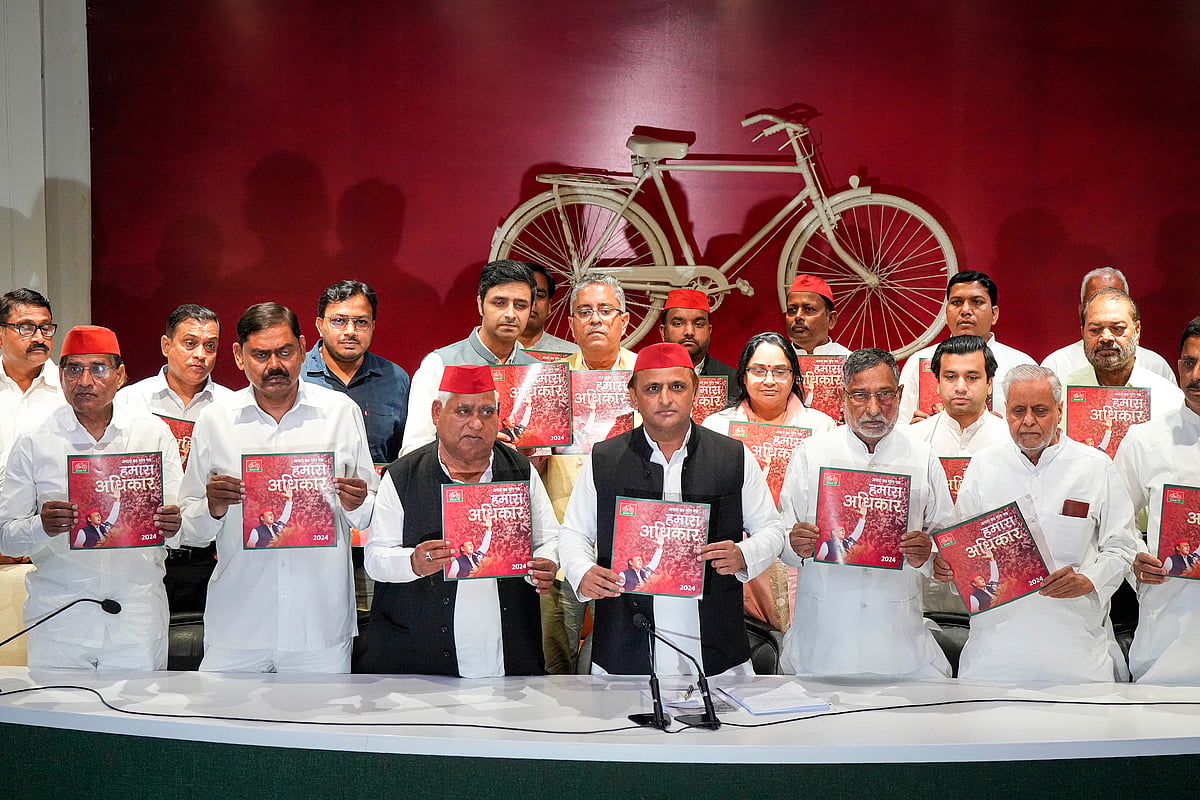  (PTI Photo/Nand Kumar) : Samajwadi Party President Akhilesh Yadav with party leaders releases party's manifesto for Lok Sabha elections, at party headquarters in Lucknow, Wednesday, April 10, 2024.