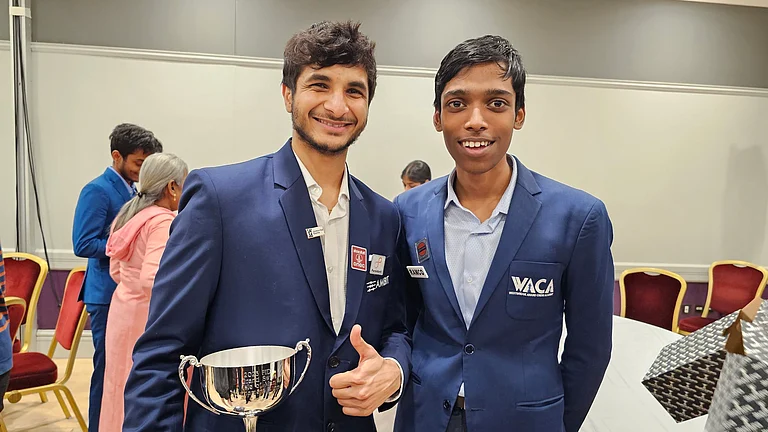 Indian Chess players R Praggnanandhaa (left) with Vidit Gujrathi. - X | R Praggnanandhaa