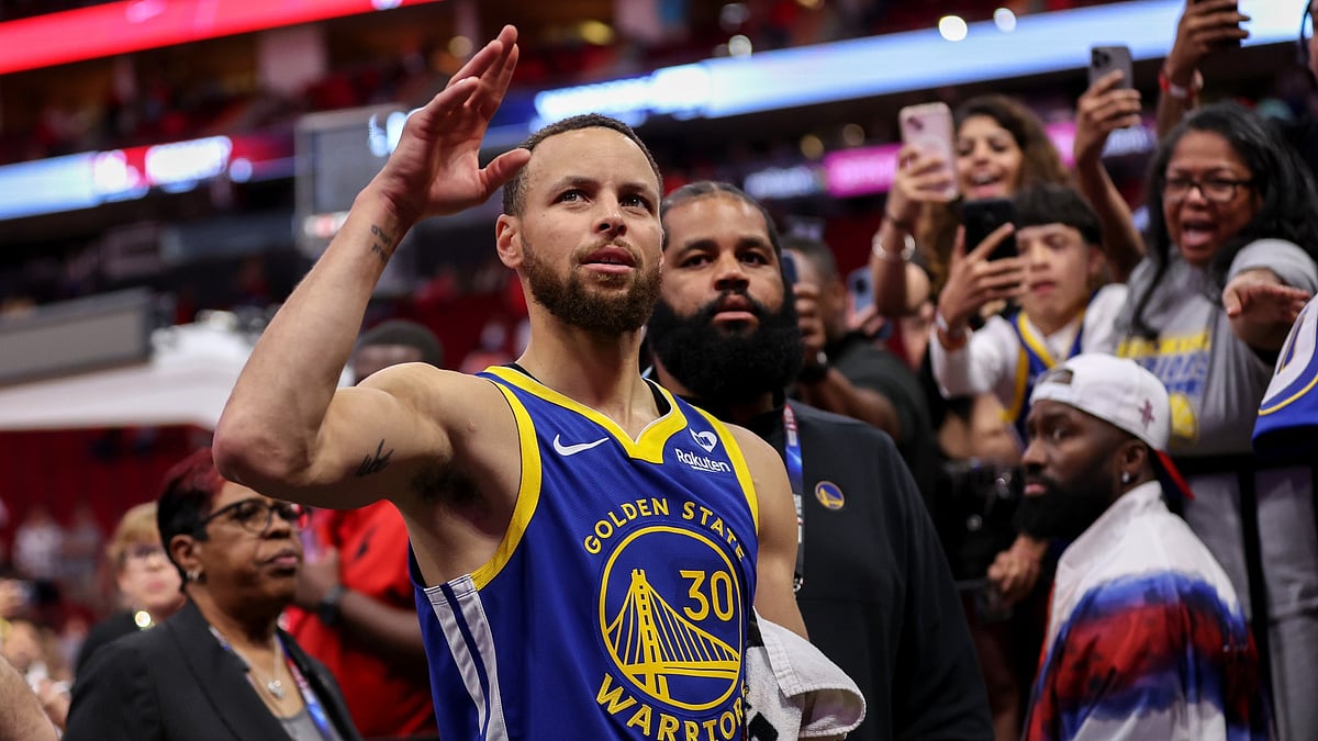Stephen Curry #30 of the Golden State Warriors waves to the crowd after the game against the Houston Rockets at Toyota Center on April 04, 2024. - File